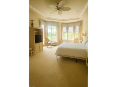 HEATED POOL & SPA WITH CASCADING WATERFALL! Welcome to Belle on Estero Country Club in Florida - for sale on GolfHomes.com, golf home, golf lot