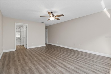 Step into your stunningly updated 2-bedroom, 2.5-bath retreat on Heritage Isles Golf and Country Club in Florida - for sale on GolfHomes.com, golf home, golf lot