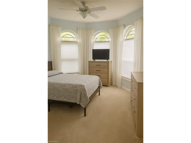 HEATED POOL & SPA WITH CASCADING WATERFALL! Welcome to Belle on Estero Country Club in Florida - for sale on GolfHomes.com, golf home, golf lot