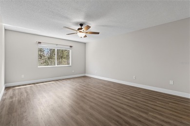 Step into your stunningly updated 2-bedroom, 2.5-bath retreat on Heritage Isles Golf and Country Club in Florida - for sale on GolfHomes.com, golf home, golf lot