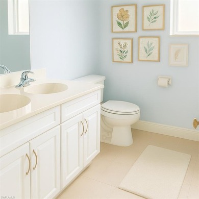 HEATED POOL & SPA WITH CASCADING WATERFALL! Welcome to Belle on Estero Country Club in Florida - for sale on GolfHomes.com, golf home, golf lot