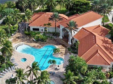 HEATED POOL & SPA WITH CASCADING WATERFALL! Welcome to Belle on Estero Country Club in Florida - for sale on GolfHomes.com, golf home, golf lot