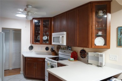 This attached home is located in Kings Point, one of Florida's on Falcon Watch Golf Club in Florida - for sale on GolfHomes.com, golf home, golf lot