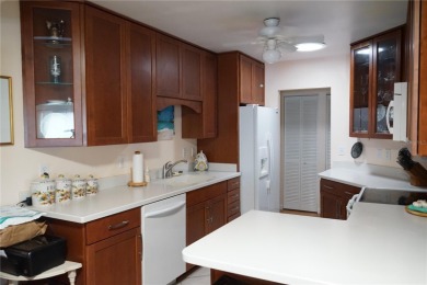 This attached home is located in Kings Point, one of Florida's on Falcon Watch Golf Club in Florida - for sale on GolfHomes.com, golf home, golf lot
