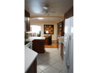 This attached home is located in Kings Point, one of Florida's on Falcon Watch Golf Club in Florida - for sale on GolfHomes.com, golf home, golf lot