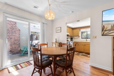 Nestled less than a mile from the pristine shores of North on Beachwood Golf Club in South Carolina - for sale on GolfHomes.com, golf home, golf lot