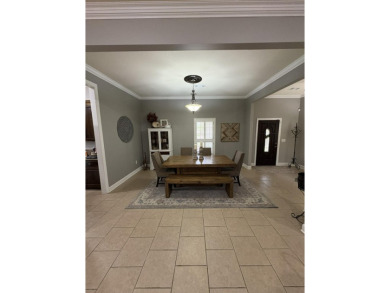 Summertime and the living is easy at this spacious 3 bedroom, 2 on Big Oaks Golf Club in Mississippi - for sale on GolfHomes.com, golf home, golf lot