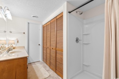 Nestled less than a mile from the pristine shores of North on Beachwood Golf Club in South Carolina - for sale on GolfHomes.com, golf home, golf lot