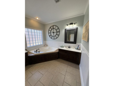 Summertime and the living is easy at this spacious 3 bedroom, 2 on Big Oaks Golf Club in Mississippi - for sale on GolfHomes.com, golf home, golf lot