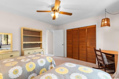 Nestled less than a mile from the pristine shores of North on Beachwood Golf Club in South Carolina - for sale on GolfHomes.com, golf home, golf lot