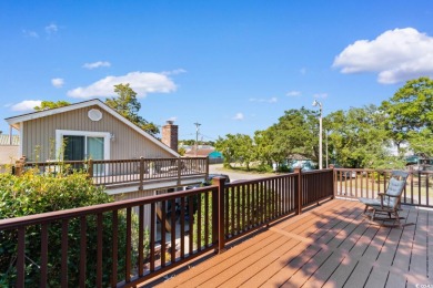Nestled less than a mile from the pristine shores of North on Beachwood Golf Club in South Carolina - for sale on GolfHomes.com, golf home, golf lot