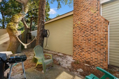 Nestled less than a mile from the pristine shores of North on Beachwood Golf Club in South Carolina - for sale on GolfHomes.com, golf home, golf lot