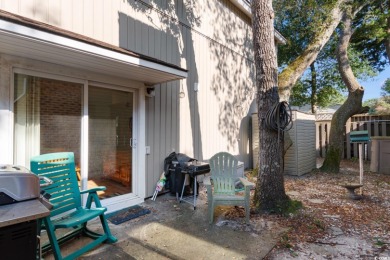 Nestled less than a mile from the pristine shores of North on Beachwood Golf Club in South Carolina - for sale on GolfHomes.com, golf home, golf lot
