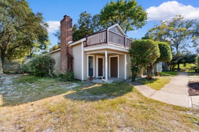 Nestled less than a mile from the pristine shores of North on Beachwood Golf Club in South Carolina - for sale on GolfHomes.com, golf home, golf lot