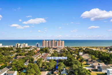 Nestled less than a mile from the pristine shores of North on Beachwood Golf Club in South Carolina - for sale on GolfHomes.com, golf home, golf lot