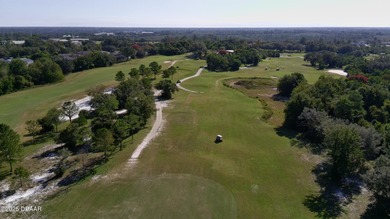 Wake up to stunning views of the 16th Fairway in this on Deltona Golf Club in Florida - for sale on GolfHomes.com, golf home, golf lot