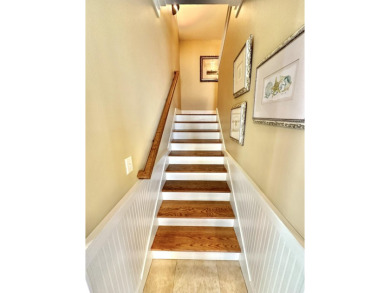 This charming four-bedroom beach cottage located in The Bungalos on Sandestin Golf and Beach Resort - Raven in Florida - for sale on GolfHomes.com, golf home, golf lot