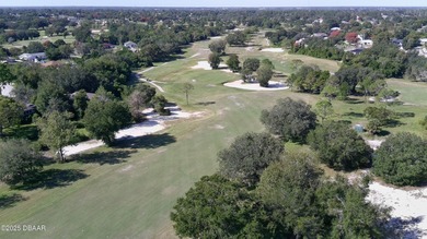 Wake up to stunning views of the 16th Fairway in this on Deltona Golf Club in Florida - for sale on GolfHomes.com, golf home, golf lot