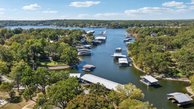 Nestled on the pristine fairway of an exclusive golf course in on The Coves Golf Course in Oklahoma - for sale on GolfHomes.com, golf home, golf lot