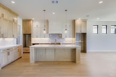 Discover luxury living at 1252 High. This 3,934 sf home features on The Tribute At the Colony in Texas - for sale on GolfHomes.com, golf home, golf lot