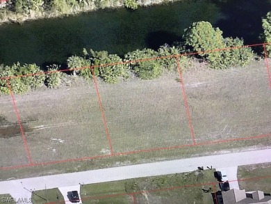 This double lot is perfect if you love living on the water in a on Del Tura Golf and Country Club in Florida - for sale on GolfHomes.com, golf home, golf lot