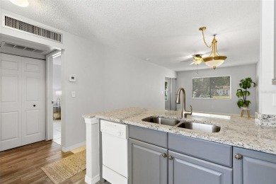 Charming 1-Bedroom End Unit Condo for 55+ buyers with access to on Highland Lakes Executive Golf Course in Florida - for sale on GolfHomes.com, golf home, golf lot