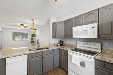 Charming 1-Bedroom End Unit Condo for 55+ buyers with access to on Highland Lakes Executive Golf Course in Florida - for sale on GolfHomes.com, golf home, golf lot