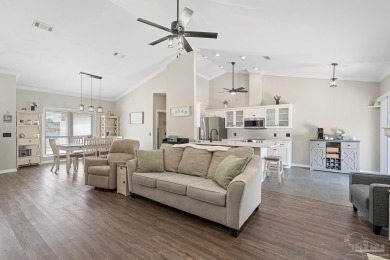 Welcome to this beautifully updated 3-bedroom, 2-bathroom home on Perdido Bay Golf Club in Florida - for sale on GolfHomes.com, golf home, golf lot