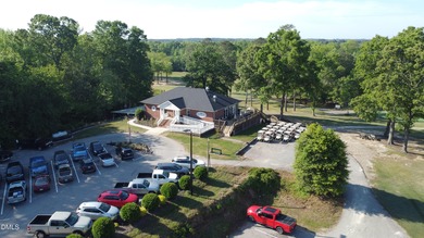 Welcome to this stunning new construction home in The River Golf on River Golf and Country Club at Lake Royale in North Carolina - for sale on GolfHomes.com, golf home, golf lot