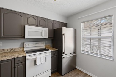 Charming 1-Bedroom End Unit Condo for 55+ buyers with access to on Highland Lakes Executive Golf Course in Florida - for sale on GolfHomes.com, golf home, golf lot