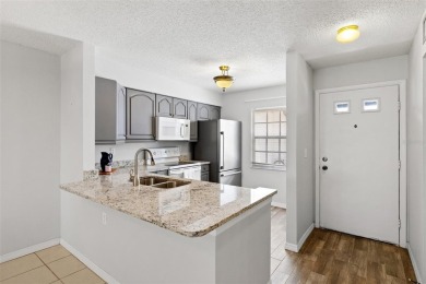 Charming 1-Bedroom End Unit Condo for 55+ buyers with access to on Highland Lakes Executive Golf Course in Florida - for sale on GolfHomes.com, golf home, golf lot