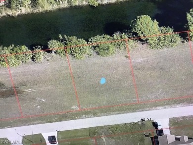 This double lot is perfect if you love living on the water in a on Del Tura Golf and Country Club in Florida - for sale on GolfHomes.com, golf home, golf lot