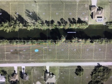 This double lot is perfect if you love living on the water in a on Del Tura Golf and Country Club in Florida - for sale on GolfHomes.com, golf home, golf lot