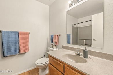 This home is a must see! The first floor boasts a functional on Raven Golf Club At South Mountain in Arizona - for sale on GolfHomes.com, golf home, golf lot