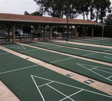 Charming 1-Bedroom End Unit Condo for 55+ buyers with access to on Highland Lakes Executive Golf Course in Florida - for sale on GolfHomes.com, golf home, golf lot