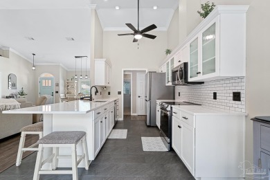 Welcome to this beautifully updated 3-bedroom, 2-bathroom home on Perdido Bay Golf Club in Florida - for sale on GolfHomes.com, golf home, golf lot