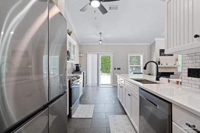 Welcome to this beautifully updated 3-bedroom, 2-bathroom home on Perdido Bay Golf Club in Florida - for sale on GolfHomes.com, golf home, golf lot