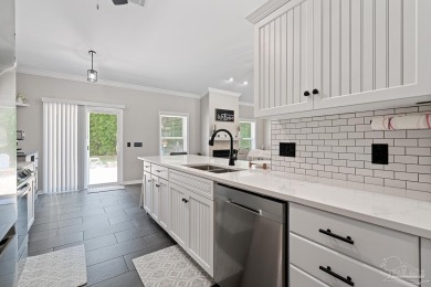 Welcome to this beautifully updated 3-bedroom, 2-bathroom home on Perdido Bay Golf Club in Florida - for sale on GolfHomes.com, golf home, golf lot