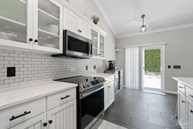 Welcome to this beautifully updated 3-bedroom, 2-bathroom home on Perdido Bay Golf Club in Florida - for sale on GolfHomes.com, golf home, golf lot