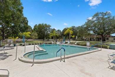 Charming 1-Bedroom End Unit Condo for 55+ buyers with access to on Highland Lakes Executive Golf Course in Florida - for sale on GolfHomes.com, golf home, golf lot