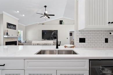 Welcome to this beautifully updated 3-bedroom, 2-bathroom home on Perdido Bay Golf Club in Florida - for sale on GolfHomes.com, golf home, golf lot