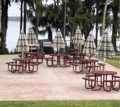 Charming 1-Bedroom End Unit Condo for 55+ buyers with access to on Highland Lakes Executive Golf Course in Florida - for sale on GolfHomes.com, golf home, golf lot