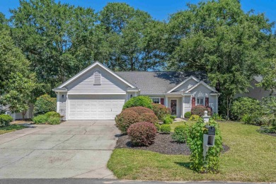 Meticulously maintained 3-bedroom, 2-bathroom home, perfectly on Pawleys Plantation Golf and Country Club in South Carolina - for sale on GolfHomes.com, golf home, golf lot