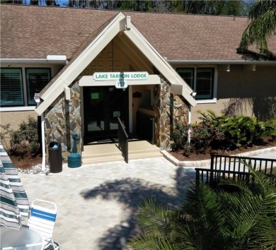 Charming 1-Bedroom End Unit Condo for 55+ buyers with access to on Highland Lakes Executive Golf Course in Florida - for sale on GolfHomes.com, golf home, golf lot