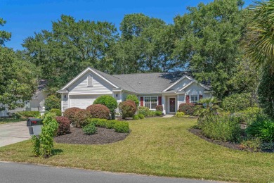 Meticulously maintained 3-bedroom, 2-bathroom home, perfectly on Pawleys Plantation Golf and Country Club in South Carolina - for sale on GolfHomes.com, golf home, golf lot