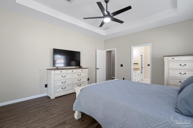 Welcome to this beautifully updated 3-bedroom, 2-bathroom home on Perdido Bay Golf Club in Florida - for sale on GolfHomes.com, golf home, golf lot