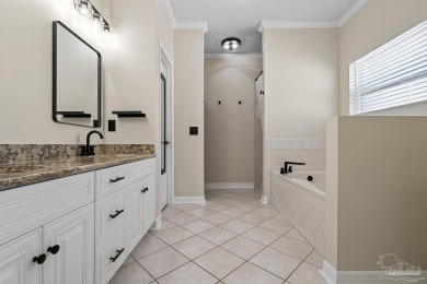 Welcome to this beautifully updated 3-bedroom, 2-bathroom home on Perdido Bay Golf Club in Florida - for sale on GolfHomes.com, golf home, golf lot