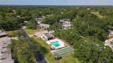 Charming 1-Bedroom End Unit Condo for 55+ buyers with access to on Highland Lakes Executive Golf Course in Florida - for sale on GolfHomes.com, golf home, golf lot