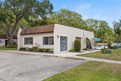 Charming 1-Bedroom End Unit Condo for 55+ buyers with access to on Highland Lakes Executive Golf Course in Florida - for sale on GolfHomes.com, golf home, golf lot