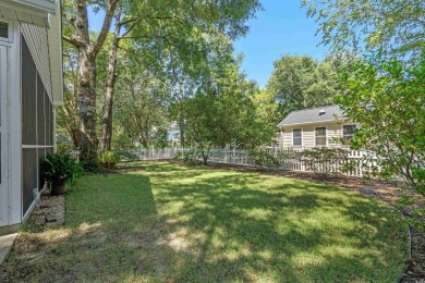 Meticulously maintained 3-bedroom, 2-bathroom home, perfectly on Pawleys Plantation Golf and Country Club in South Carolina - for sale on GolfHomes.com, golf home, golf lot